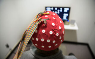 person wearing an EEG cap
